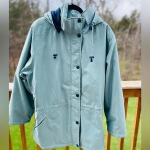 Women’s Winter Coat with zipper and snap flap. Color is muted sea foam green XL